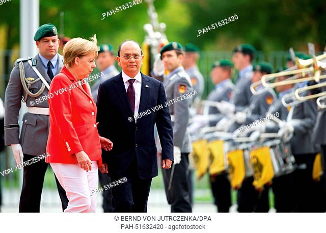 German Chancellor Angela Merkel welcomes Burmese President Thein Sein with military honours at the Federal Chancellery in Berlin, Germany, 03 September 2014