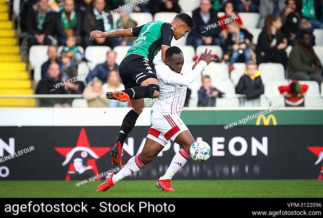 Cercle's David Sousa and Standard's Jackson Muleka fight for the ball during a soccer match between Cercle Brugge KSV and Standard de Liege