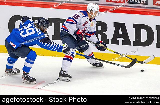 Kim Nousiainen of Finland, left, and Nick Robertson of USA in action during the 2020 IIHF World Junior Ice Hockey Championships quarterfinal match between USA...
