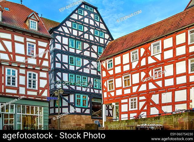 Street with half-timbered houses in Marburg , Germany