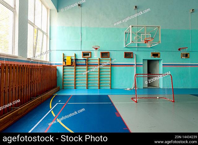 Anapa, Russia - October 5, 2019: Fragment of a sports hall with a ladder, a basketball hoop and small gates