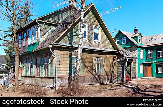 VILNIUS, LITHUANIA- MARCH 24, 2018: The old collapsing wooden houses are still in use in the historical district of the Lithuanian capital Zverinas (zoo)