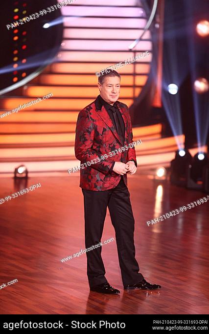 23 April 2021, North Rhine-Westphalia, Cologne: Joachim Llambi, member of the jury, stands on the dance floor during the seventh RTL show of ""Let's Dance""