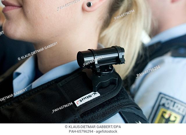 A federal policewomen wearing the body camera ZEPCAM T1 XT at the central station in Berlin, Germany, 12 February 2016. As of today