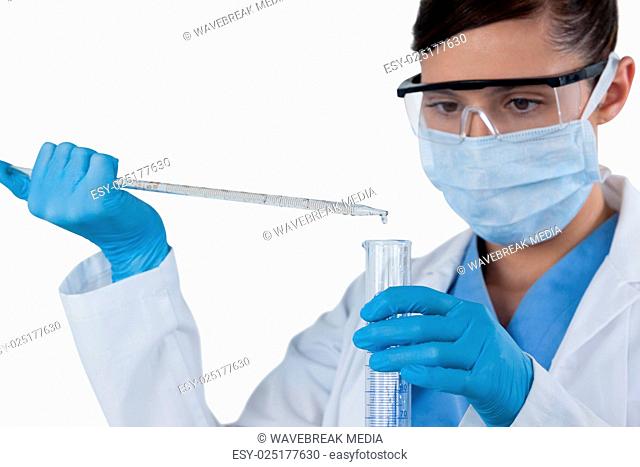 Female scientist conducting an experiment