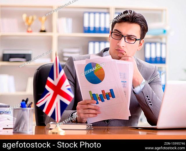 The businessman with british flag in the office