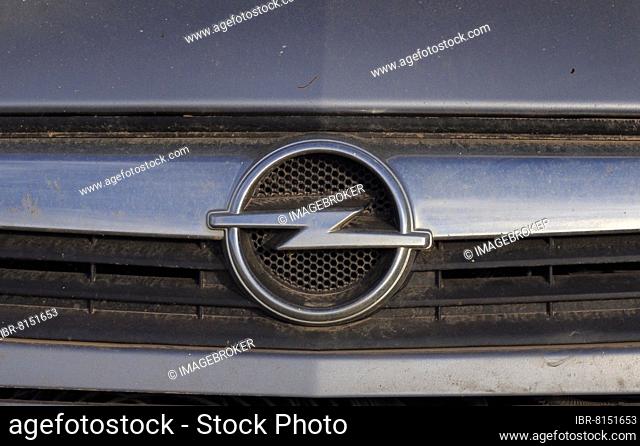 Opel car logo on front, detail view, scrap car, scrap yard, metal recycling, recycling of scrap metal, metal recycling, sustainability