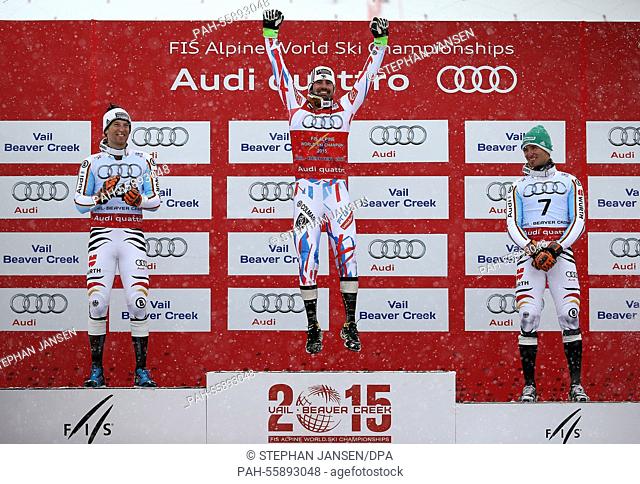 (L-R) Fritz Dopfer of Germany (silver), Jean-Baptiste Grange of France (gold) and Felix Neureuther of Germany (bronze) during the winner's presentation of the...