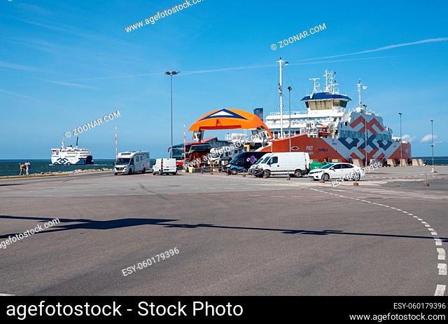 Virtsu, Estonia - 13 August, 2021: ferry unloading passengers and cars in the harbor of Virtsu