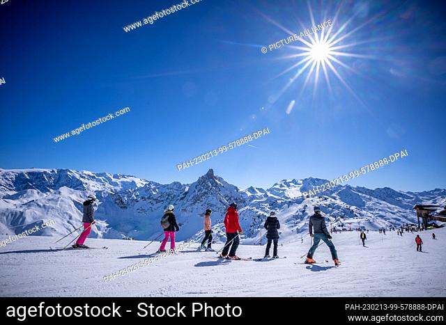 13 February 2023, France, Courchevel: Ski tourists are on a slope in the French Alps in the ski resort of Courchevel-Meribel