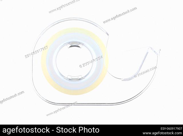 A sticky tape dispenser on white with clipping path