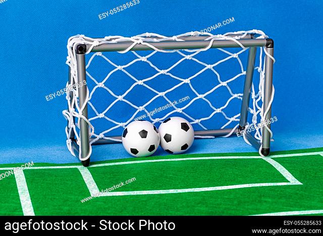 Toy football field and gate - sport background