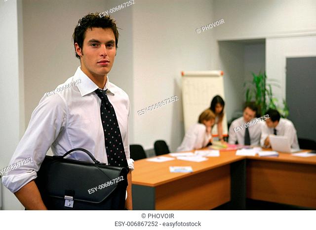 Man arriving at business meeting