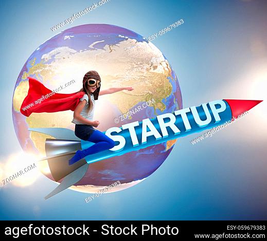 The small kid in start-up concept flying rocket