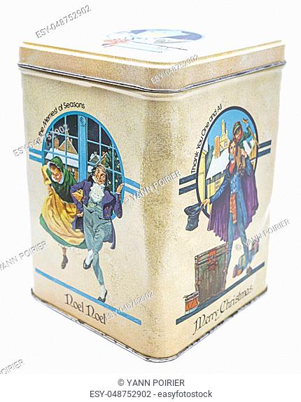 isolated vintage christmas metal tea box against white background