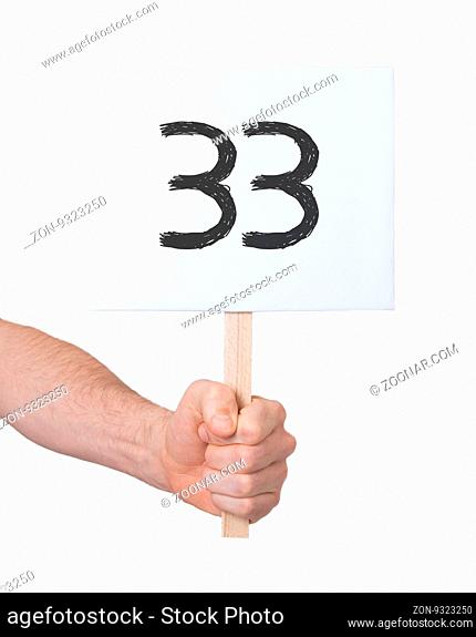 Sign with a number, isolated on white - 33