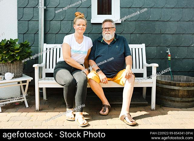 dpatop - 26 August 2022, Lower Saxony, Bockenem: Julia and Peter Fricke sit in the family garden in Bockenem. Peter Fricke received a donor heart a good 30...