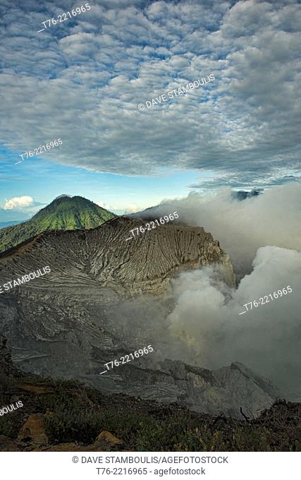 view of the smoking Kawah Ijen volcanic crater and lake, Java, Indonesia