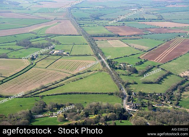 The Fosse Way Roman Road looking South West towards Cirencester, Gloucestershire, 2018, UK. Aerial view