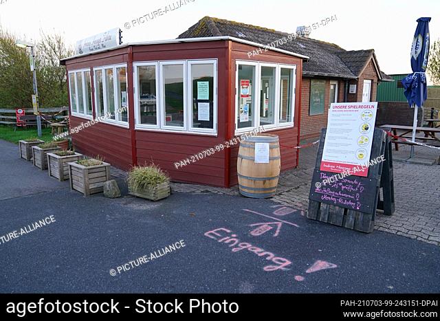 10 May 2021, Schleswig-Holstein, Pellworm: The Hooger Fähre snack bar on the North Sea island of Pellworm. The green North Frisian island leads rather a shadowy...