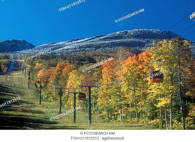 gondola, fall, Stowe, VT, Vermont, Mount Mansfield, Red gondolas at Stowe Mountain Resort go up to Mt. Mansfield with its first dusting of snow surrounded by...