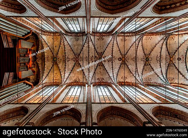 Lubeck, Germany - August 3, 2019: Directly below view of the vaults of St. Mary Church in Lubeck