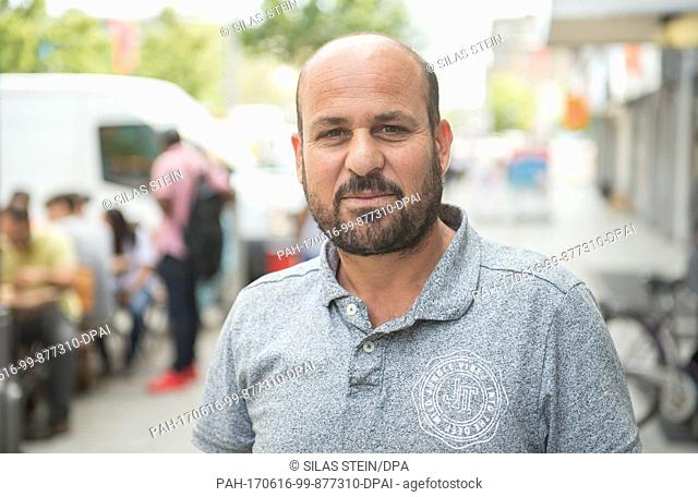 Dawed Suleiman from Iraque stands in the pedestrian zone in Hanover, Germany, 15 June 2017. Three years ago he came from Iraque to Germany and currently attends...