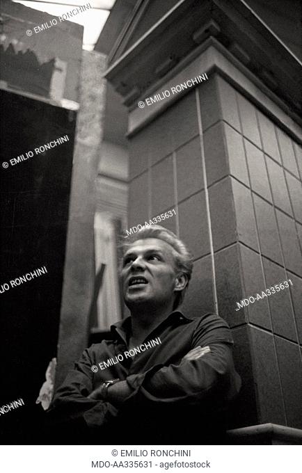 Giorgio Albertazzi leaning on a column. The Italian actor Giorgio Albertazzi leaning on a column. Milan, 1959