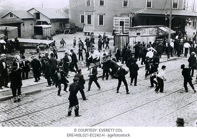 Polish oil refinery workers in Bayonne, New Jersey, confront company guards outside the Standard Oil Works moments before the private police opened fire