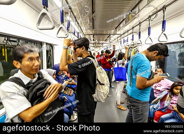 Passengers On The Metro (MRT), Jakarta, Indonesia
