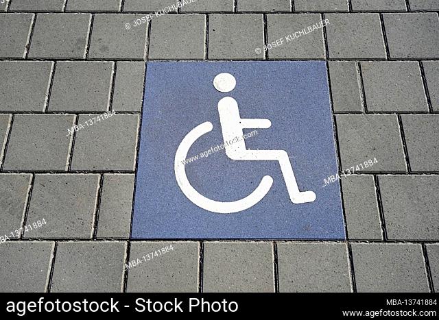 Germany, Bavaria, Altötting district, supermarket, parking space for the disabled, paved floor, wheelchair, symbol