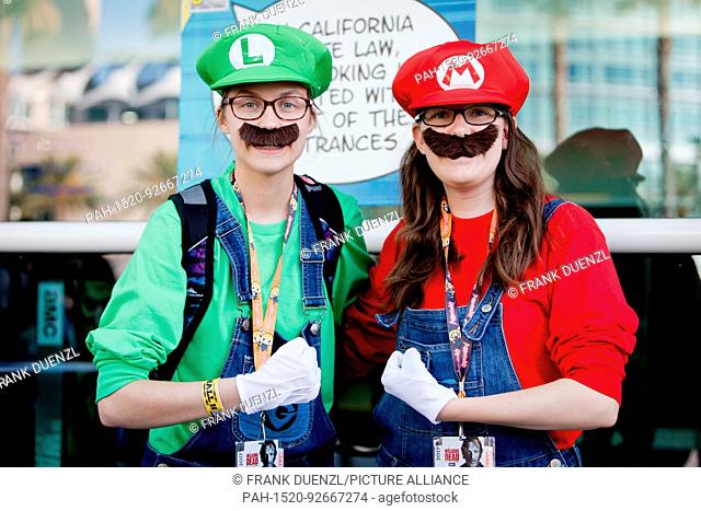 Cosplayers Alicia as ""Luigi"" and Meagan as ""Mario"" from ""Super Mario"", came all the way from Albuquerque to the Comic-Con San Diego, in July 2017