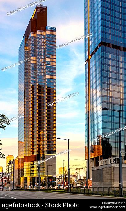 Warsaw, Poland - May 10, 2021: New business and financial district Wola with Warsaw Unit and Skyliner tower skyscrapers at Prosta street and Daszynskiego circle