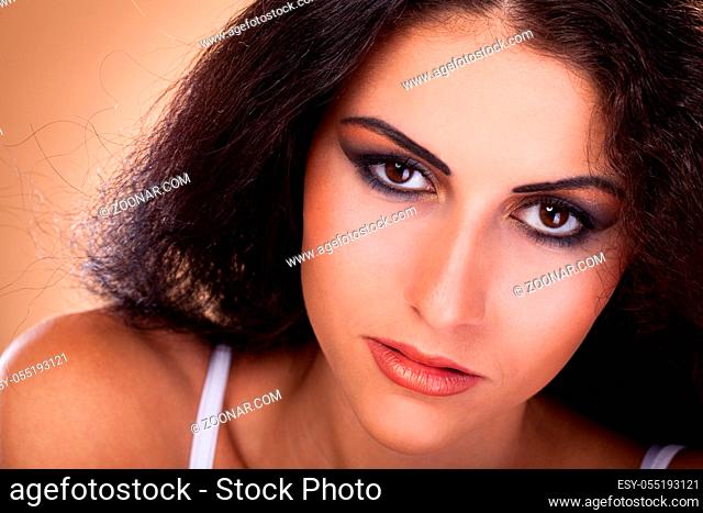 Portrait of beautiful woman with bright makeup