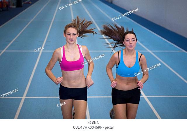 2 female athletes racing