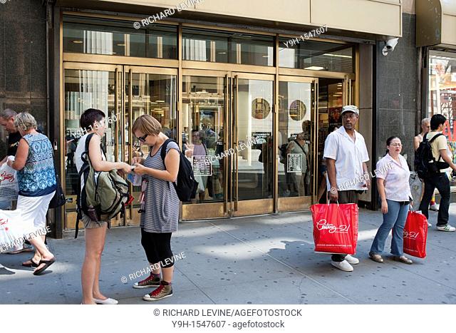 Shoppers outside the famed Century 21 department store in Lower Manhattan in New York