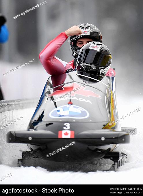 23 January 2021, Bavaria, Schönau Am Königssee: Bobsleigh: World Cup, two-man bobsleigh, men. Canadian bobsledders Justin Kripps and Cam Stones cross the finish...