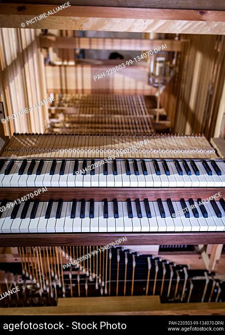 02 May 2022, Mecklenburg-Western Pomerania, Pinnow: The keyboard of the new organ for the village church from the 14th century