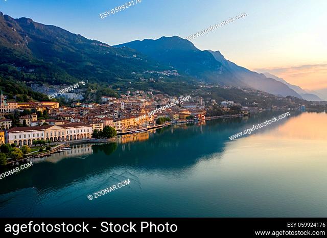 Aerial view of Lake Iseo at sunrise, on the left the city of lovere which runs along the lake, Bergamo Italy