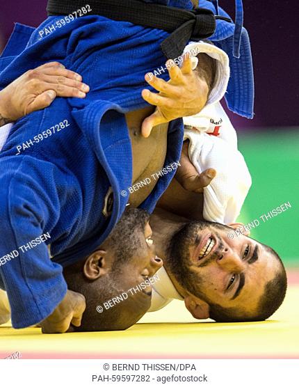 Belgium's Toma Nikiforov (white) competes in the Men's -100kg Bronze Medal Final with Jorge Fonseca of Portugal at the Baku 2015 European Games in Heydar Aliyev...