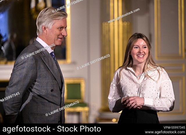 King Philippe - Filip of Belgium and Winner Lea Defour pictured during the award ceremony of the 2022 edition of the Belgodyssee prize for young journalists