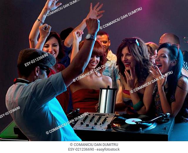 women flirting with dj in night club