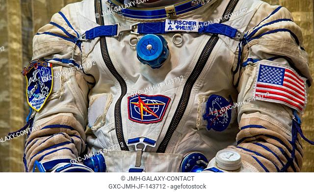 Expedition 50 backup crew member, NASA astronaut Jack Fischer, dons his Sokol suit ahead of his Soyuz qualification exams with Russian cosmonaut Fyodor...