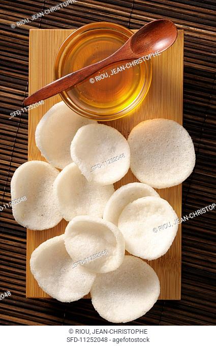 Prawn crackers on a wooden board