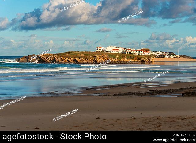 Baleal island beach with atlantic ocean and local houses in Peniche, Portugal