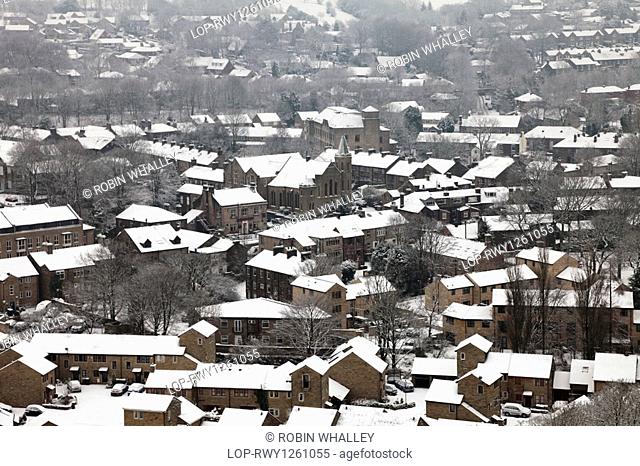 England, Lancashire, Uppermill, A view over the snow covered rooftops of Uppermill on Saddleworth