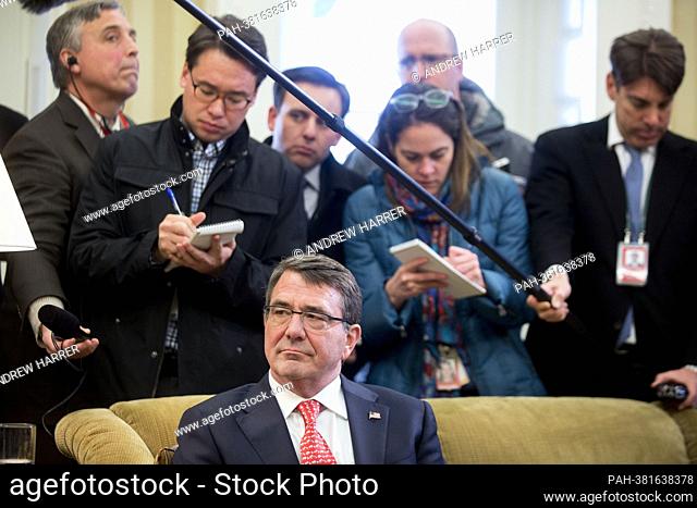 United States Secretary of Defense Ashton Carter listens as U.S. President Barack Obama, not pictured, speaks during a meeting in the Oval Office of the White...
