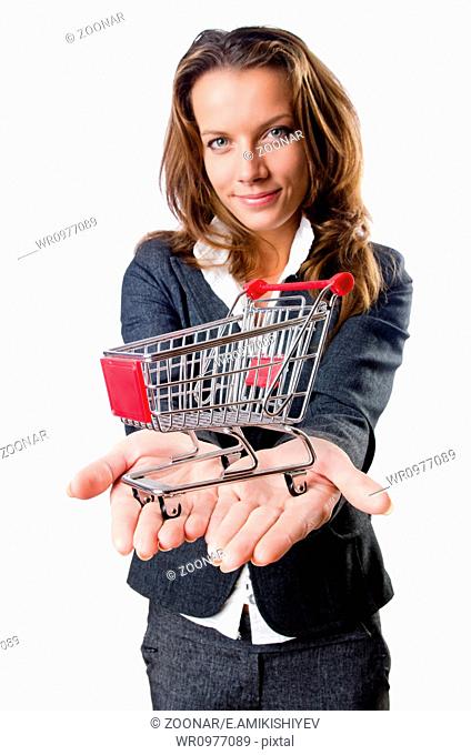 Attractive businesswoman with shopping cart