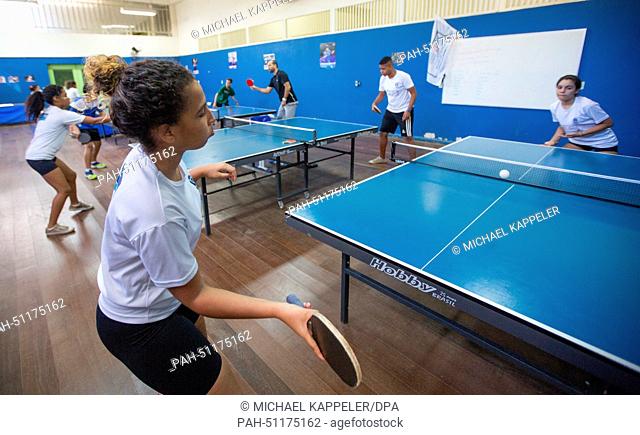 Students of Brazil's first sports high school, Ginasio Experimental Olimpico (GEO), practice table tannis in Rio de Janeiro, Brazil, 8 August 2014