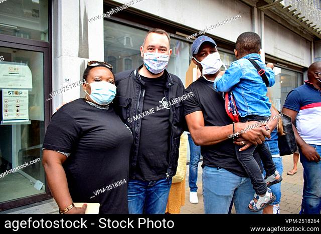 CdH chairman Maxime Prevot poses with people, during a protest against racism and police violence, in Namur, Saturday 11 July 2020.